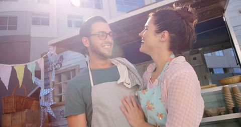 Cheerful Young Couple Enjoying Market Day Together