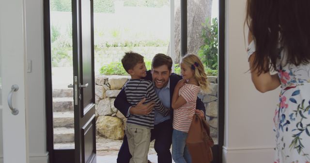 Happy Father Reuniting with Children at Home Entrance - Download Free Stock Images Pikwizard.com