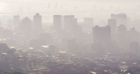 Urban Skyline with Misty Atmospheric Haze - Download Free Stock Images Pikwizard.com