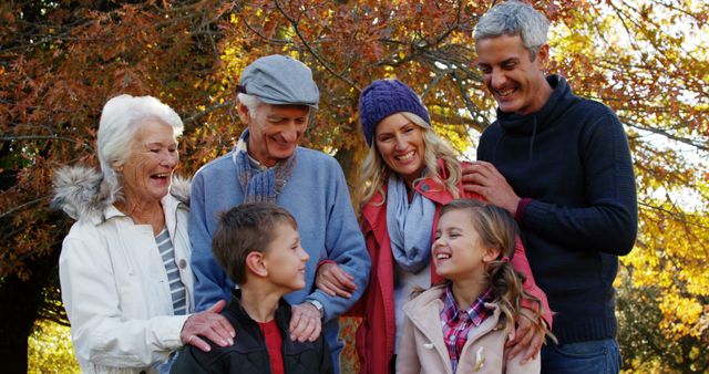 Multigenerational Family Enjoying Autumn Garden Outdoors - Download Free Stock Images Pikwizard.com