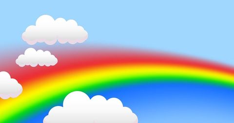 Clouds and Vibrant Rainbow with Clear Blue Sky Background