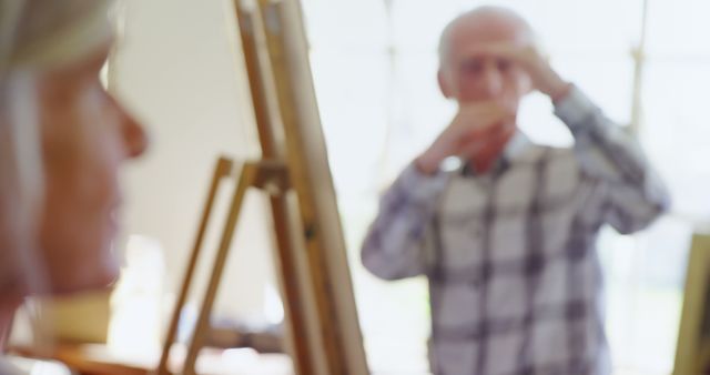 Seniors Participating in Art Class with Easel - Download Free Stock Images Pikwizard.com