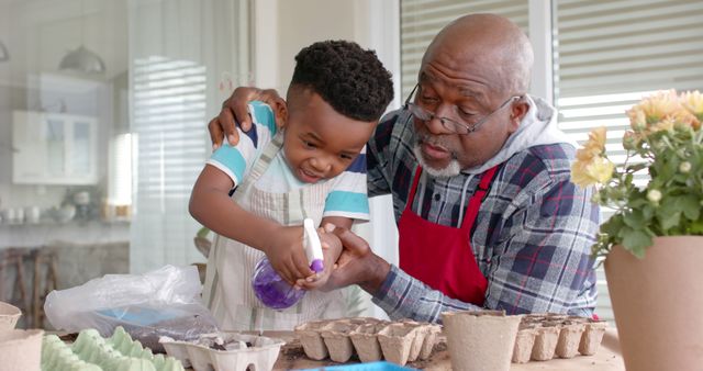 Grandfather and Child Gardening Together Indoors - Download Free Stock Images Pikwizard.com