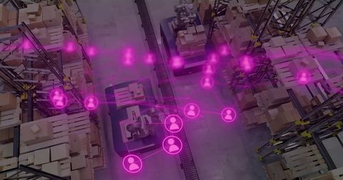 Smart warehouse automation showing connected robotic palletizers and conveyor network overlay