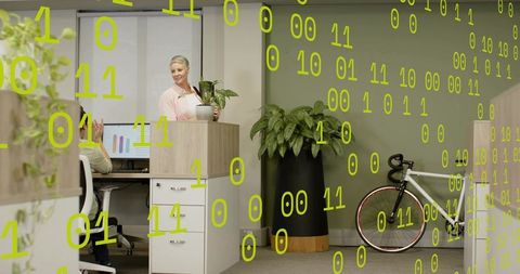 Office collaboration merging greenery and tech with woman holding plant and binary overlay