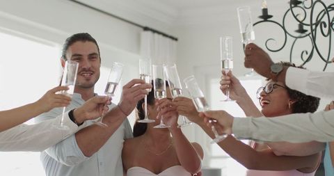 Friends Celebrating Wedding with Champagne Toast