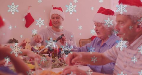 Family Enjoying Festive Christmas Dinner with Santa Hats