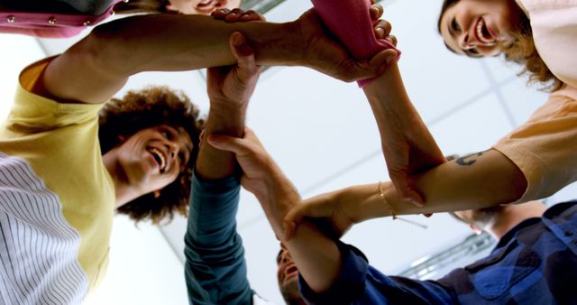 Diverse Team Celebrating Success with Group Hand Stack - Download Free Stock Images Pikwizard.com