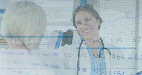 Caucasian Female Doctors Collaborating with Stock Market Chart Overlay - Download Free Stock Images Pikwizard.com