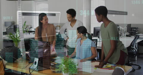 Dynamic Team Analyzing Financial Growth in Modern Office