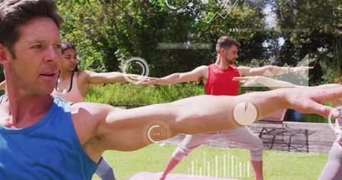 Outdoor group yoga class with instructor leading warrior ii pose, fitness hud overlays