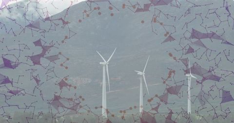 Wind Turbines with Digital Network Overlay in Mountainous Landscape