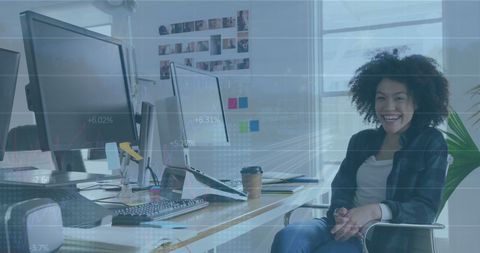 Biracial Businesswoman Analyzing Financial Data in Modern Office - Download Free Stock Images Pikwizard.com