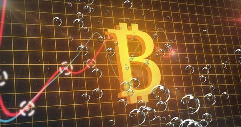Glowing bitcoin symbol over digital graph with bubbles