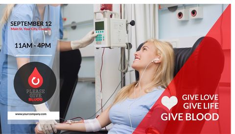 Smiling woman donating blood at health campaign drive