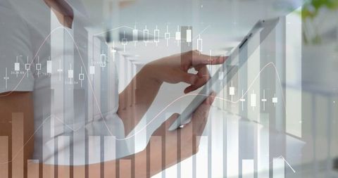 Tech-Savvy Woman Engaging with Financial Data on Tablet