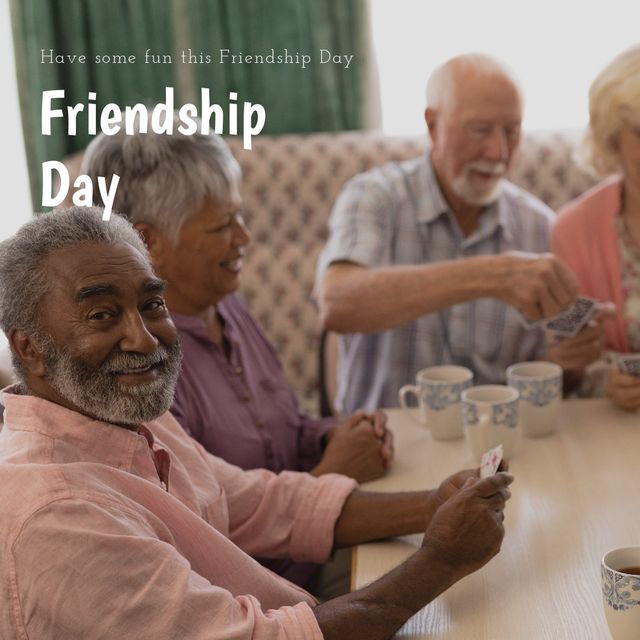 Friendship day text banner over group of diverse senior people playing cards at retirement home. friendship day and retirement concept