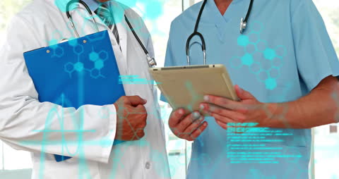 Digital Data Analysis by Doctors with Tablet and Holographic Display