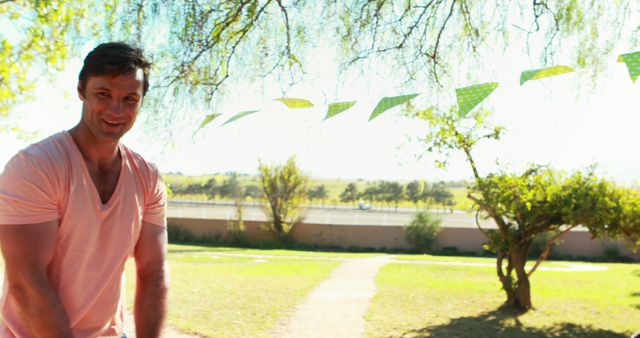 Man Enjoying Sunny Day at Outdoor Picnic - Download Free Stock Images Pikwizard.com