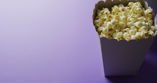 Popcorn Tub with Purple Background and Copy Space - Download Free Stock Images Pikwizard.com