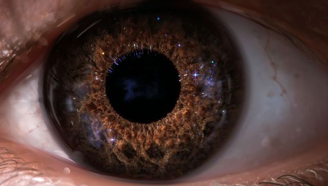 Macro brown iris capturing cosmic starfield, surreal human eye detail and texture closeup