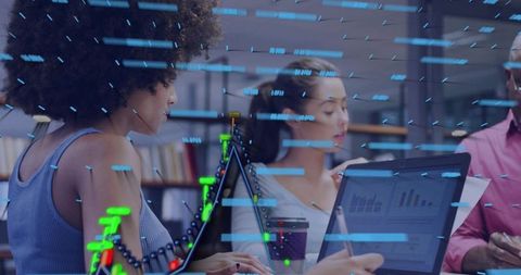 Collaborating on financial analytics dashboard with laptop charts and data visualization