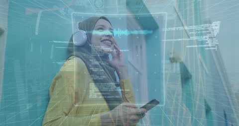 Biracial Woman Engaging with digital interface and smartphone