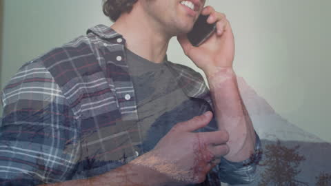 Double Exposure of Smiling Man Using Smartphone and Nature