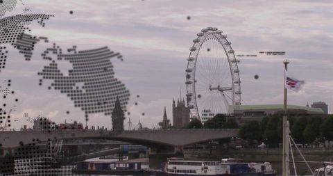 London Eye with Thames and Union Jack in Foggy Skyline