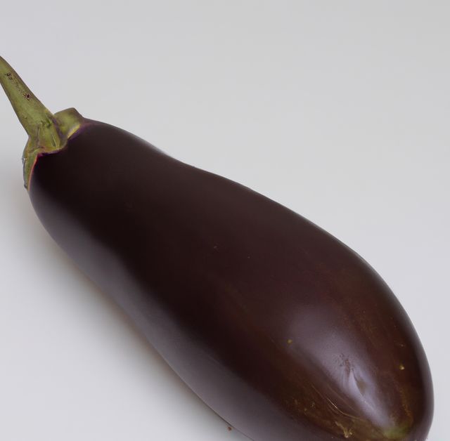 Close up of eggplant on white background created using generative ai technology. Vegetables, food and nutrition concept, digitally generated image.