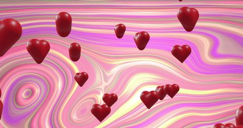 Floating red hearts on swirled pastel background