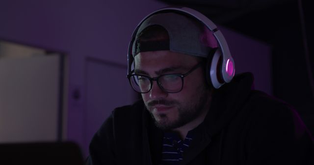 Gamer Wearing Headphones Playing Video Game in Dark Room - Download Free Stock Images Pikwizard.com