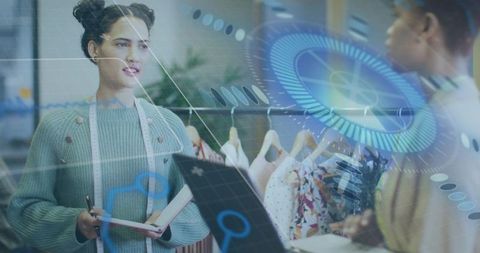 Fashion consultant reviewing boutique apparel with digital hud and tablet collaboration