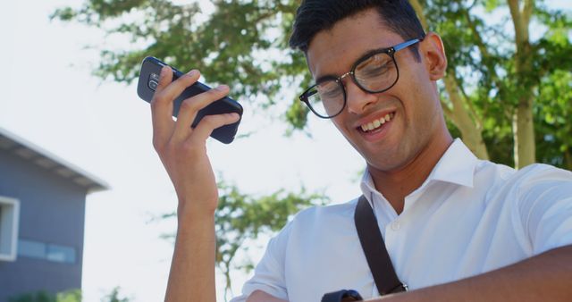 Young Professional Man Laughing Checking Smartwatch - Download Free Stock Images Pikwizard.com