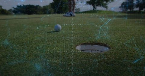 Golf Ball Resting Near Hole on Putting Green with Augmented Reality Shot Analytics