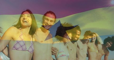 Smiling friends celebrating with ghana flag overlay on sunny beach, diverse young adults