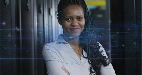 Confident Female IT Engineer in Data Center with Digital Overlay - Download Free Stock Images Pikwizard.com