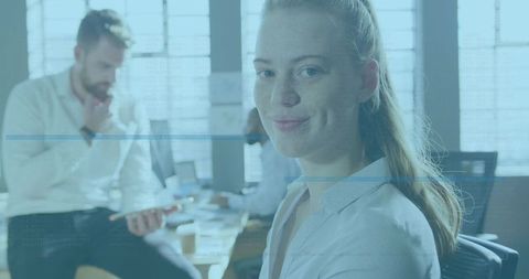 Smiling Businesswoman at Office with Business Technology Overlay