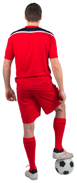 Football Player in Transparent Red Gear Standing with Soccer Ball - Download Free Stock Videos Pikwizard.com