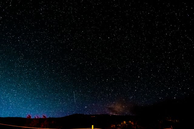 Enchanting Night Sky Filled with Shining Stars and Faint Meteor Trails - Download Free Stock Photos Pikwizard.com