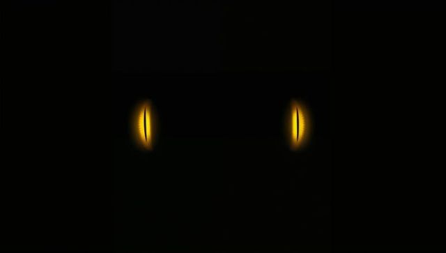 Mysterious Glowing Eyes in Dark Void