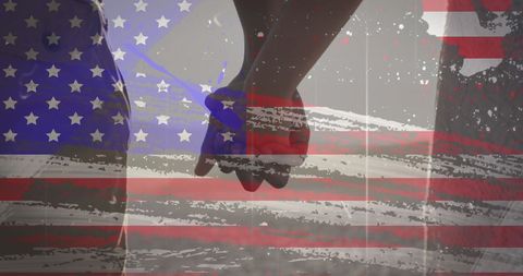 Couple Holding Hands with American Pride at Beach