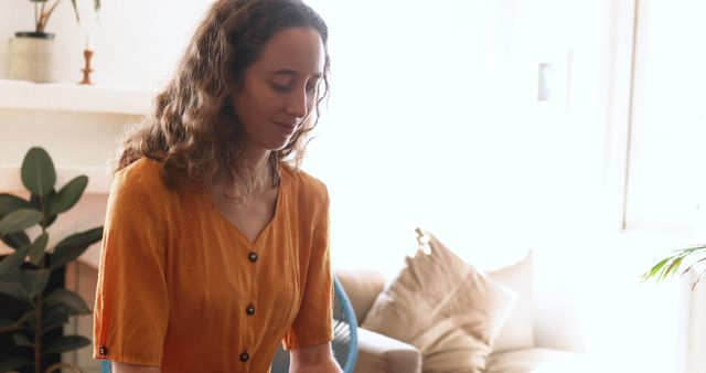 Woman Practicing Meditation at Home in Bright Living Room - Download Free Stock Images Pikwizard.com