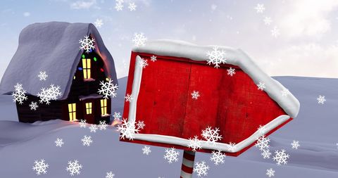 Winter Wonderland with Christmas Cottage and Snowy Red Sign