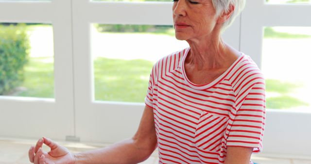 Senior Woman Practicing Mindfulness Meditation at Home - Download Free Stock Images Pikwizard.com