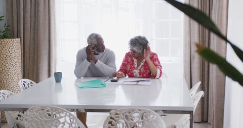 Senior African American Couple Planning Finances at Home - Download Free Stock Images Pikwizard.com