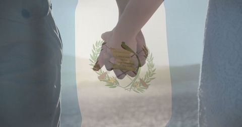 Couple Holding Hands at Serene Beach Sunset
