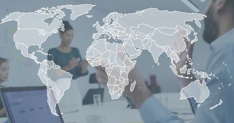 Global business collaboration in modern office with world map overlay