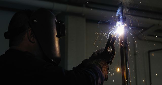 Industrial Welder Working with Spark Show Outdoors - Download Free Stock Images Pikwizard.com