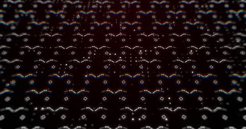 Dynamic Abstract Display with Rotating Squares on Dark Background